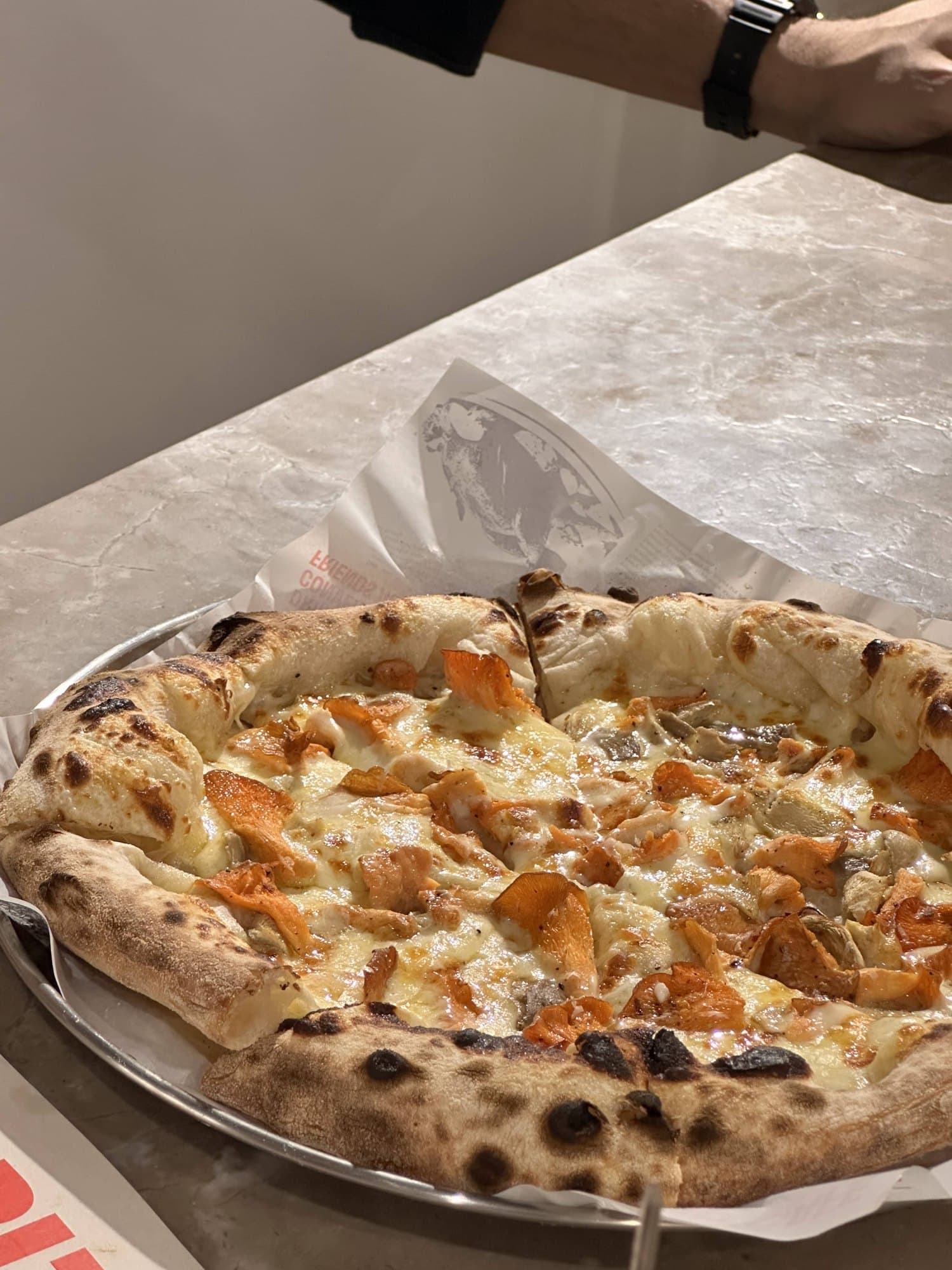 Wood-fired pizza topped with Shroomy mushrooms at Double Zero Pizza